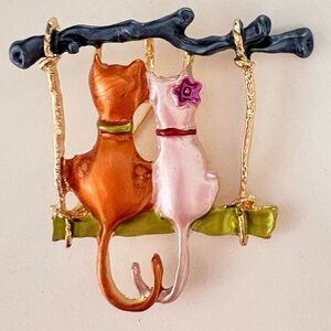 Charming enamel, Cat Couple Brooch - Orange and Pink sitting on a swing